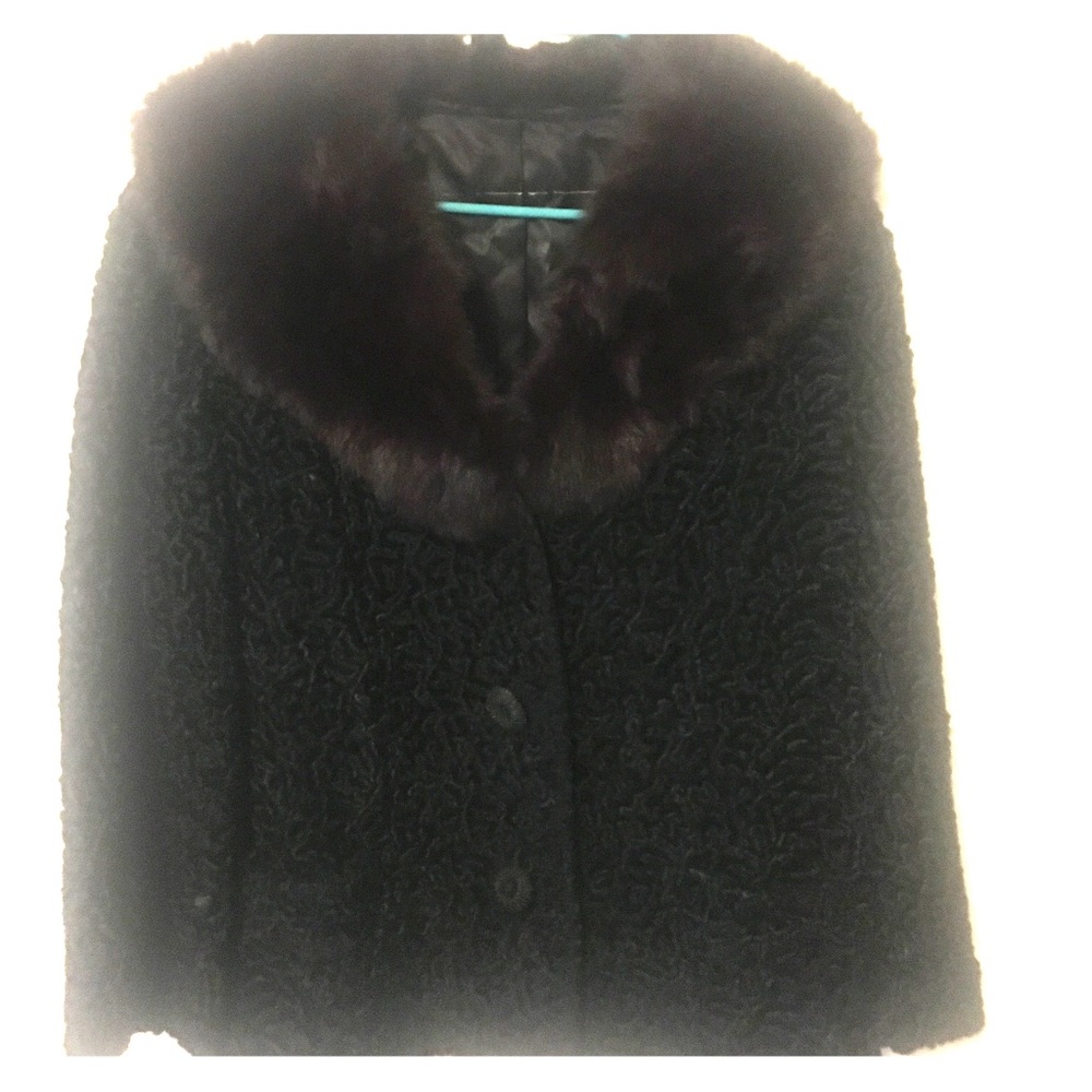Women’s black faux Persian lamb fur coat